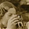 Ellen Pollack with camera, 1930s